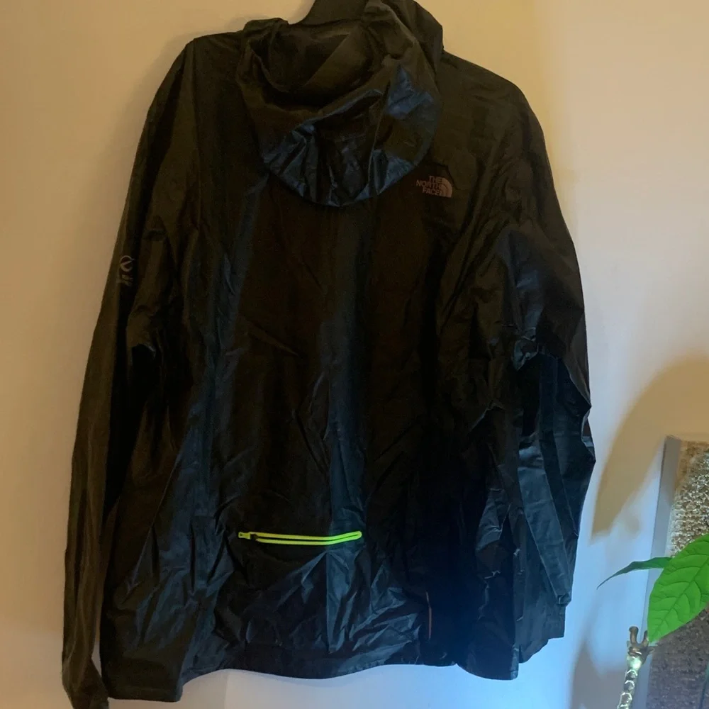 The North Face Men's Black Raincoat with Bright Yellow Zipper